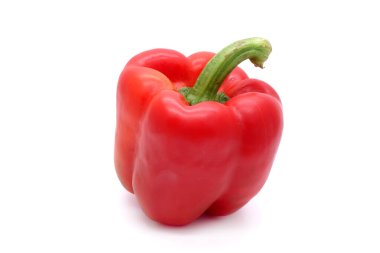 Kırmızı Capsicum. Beyaz arka planda izole edilmiş. (Gıda malzemeleri: taze ve lezzetli)