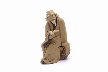 Chinese clay sculpture of Confucius isolated on white background clipart
