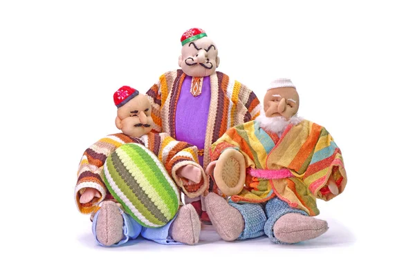 伝統的なウイグル人の人形 ウイグル人の商人は 白い背景に孤立した — ストック写真