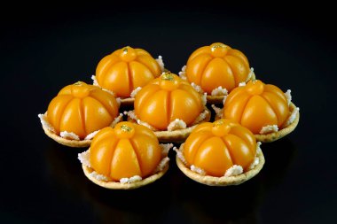 Thai dessert (Royal Thai cuisine) : Golden crown cake (Kha nom Dara Thong or Ja Mong Kut) , one of famous nine auspicious desserts in Thai tradition, made from yolk, wheat flour and edible gold