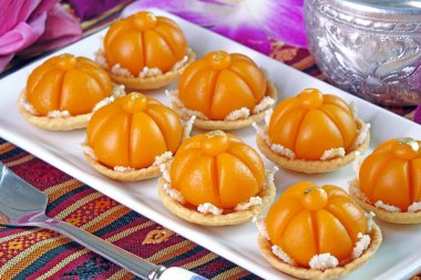 Thai dessert (Royal Thai cuisine) : Golden crown cake (Kha nom Dara Thong or Ja Mong Kut) , one of famous nine auspicious desserts in Thai tradition, made from yolk, wheat flour and edible gold
