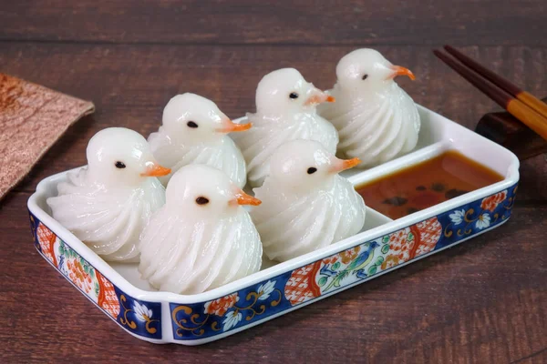 Dumpling : White pigeon-shaped (Birds-shaped) dumpling, delicious traditional asian food.(Chinese dumpings or Jiaozi)