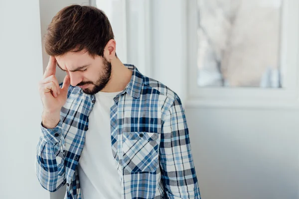 Depressed young man feeling hopeless.