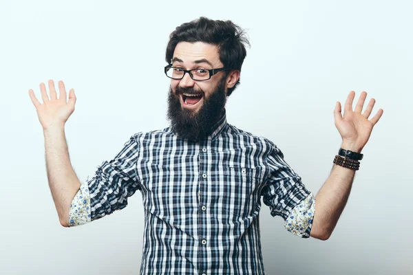 Homem com óculos mostrando sinal de boas-vindas — Fotografia de Stock