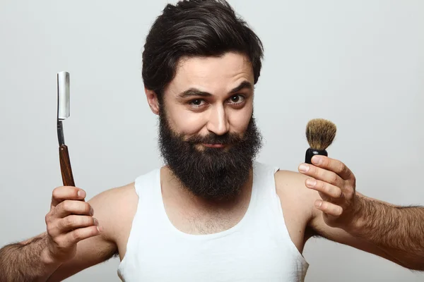 Jilet gösterilen sakallı — Stok fotoğraf