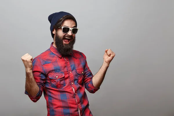 Lucky young hipster man — Stock Photo, Image