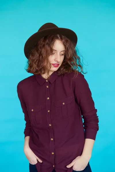 Beautiful brunette in stylish hat — Stock Photo, Image