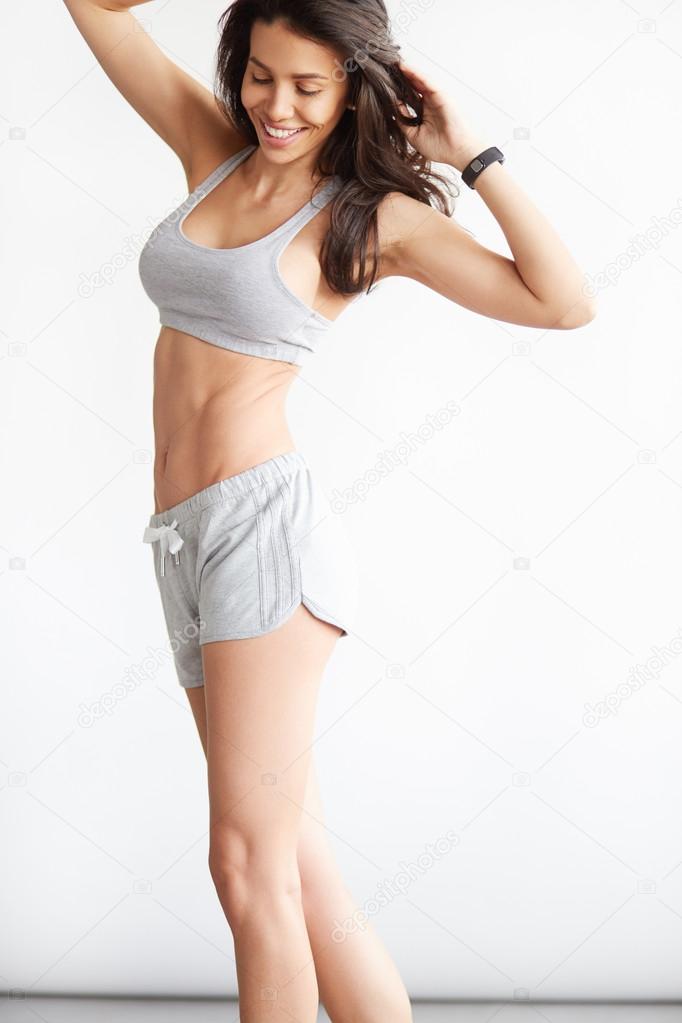 Slim Woman Smiling She Puts Away Stock Photo 2320215127