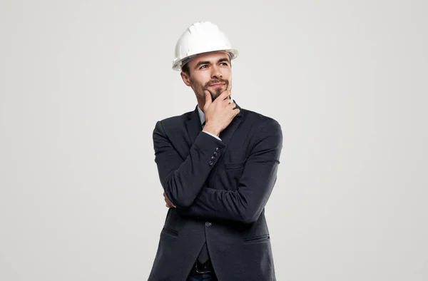 Thoughtful male architect looking away — Stock Photo, Image