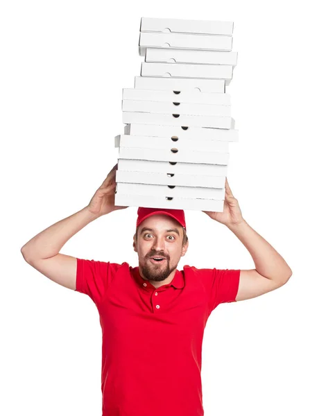 Positiv leverans man med hög av pizza lådor — Stockfoto