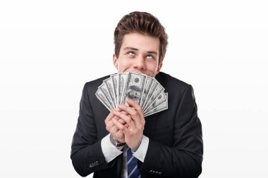 Bir sürü dolarları olan aç gözlü iş adamı.