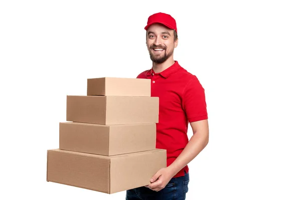 Correio alegre entregando caixas de papelão — Fotografia de Stock