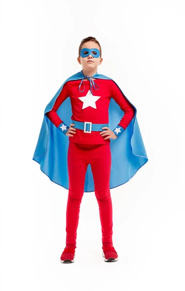 Kid in superhero costume and mask — Stock Photo, Image