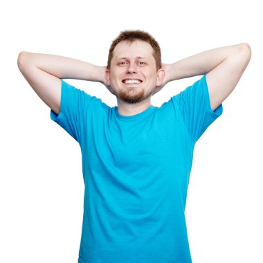 Smiling young man in blank blue t-shirt