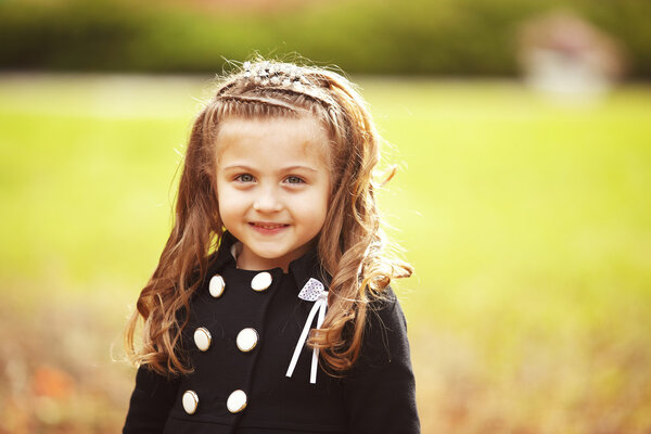 Autumn portrait of cute little girl