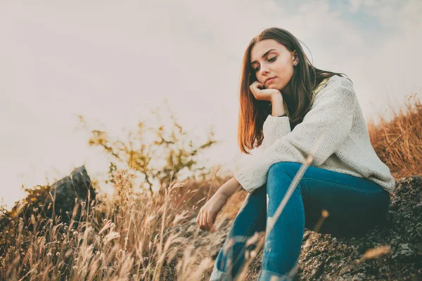 Sad girl thinking outdoors — Stock Photo, Image