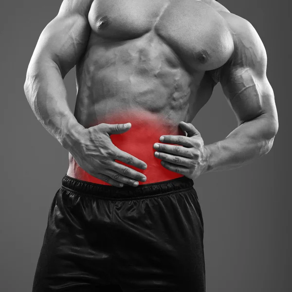 Homem muscular Dor no lado esquerdo do abdômen — Fotografia de Stock