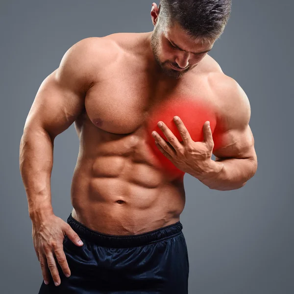 Ahtletic muscle man Heart pain — Stock Photo, Image