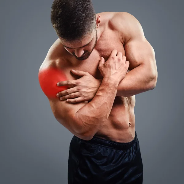 Homem musculoso atletismo Dor de ombro — Fotografia de Stock