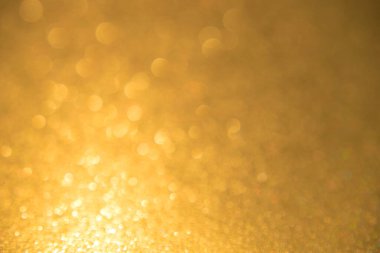 Altın ışık parıltısı Bokeh soyut arkaplan