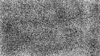 Beyaz yüzeydeki siyah parçacıkların dinamik spreyi. Küçük noktalarla hızlı hareket eden hisse senedi animasyonu.