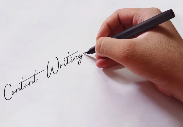 Content Writing Backdrop Design with Pen in a Hand writing on the paper. Writing on paper Background concept, for editors and content writers