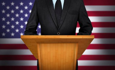 Siyasi Kişilik Konferans Sahnesinde Duruyor ve Amerika Birleşik Devletleri Arkaplanı ile Medya ile konuşuyor. Modern siyasi konsept