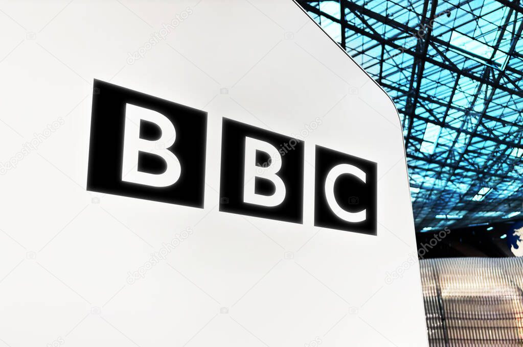 BBC black and white logo side view low angle, editorial backdrop