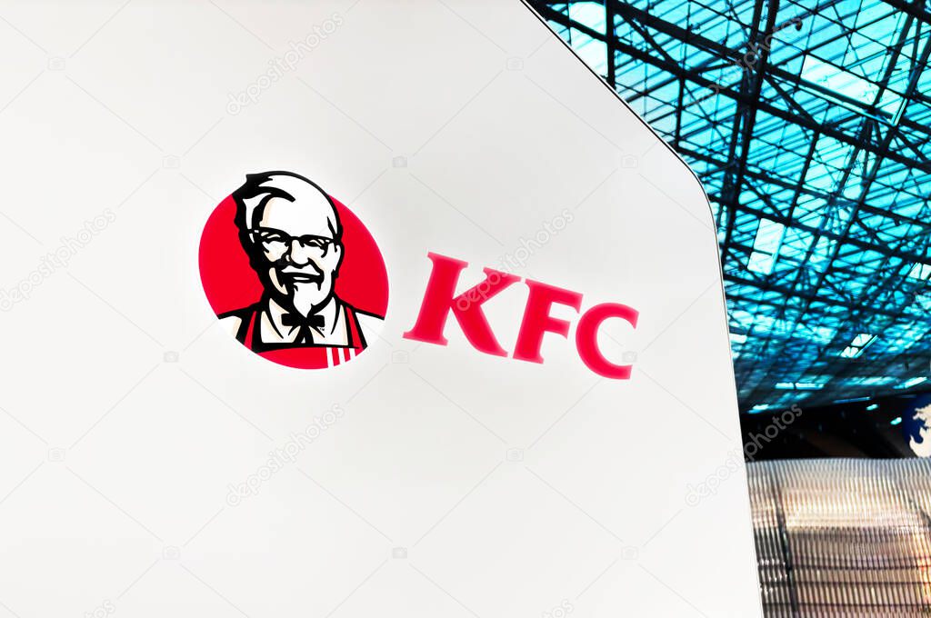 KFC fast food resturant outlet concept editorial background with logo on the wall.