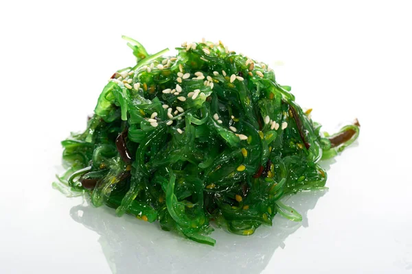 Edible Green Algae, Sea Vegetable Isolated. Green Chuka Seaweed Salad Isolated on White Background. Edible Seaweed Top View