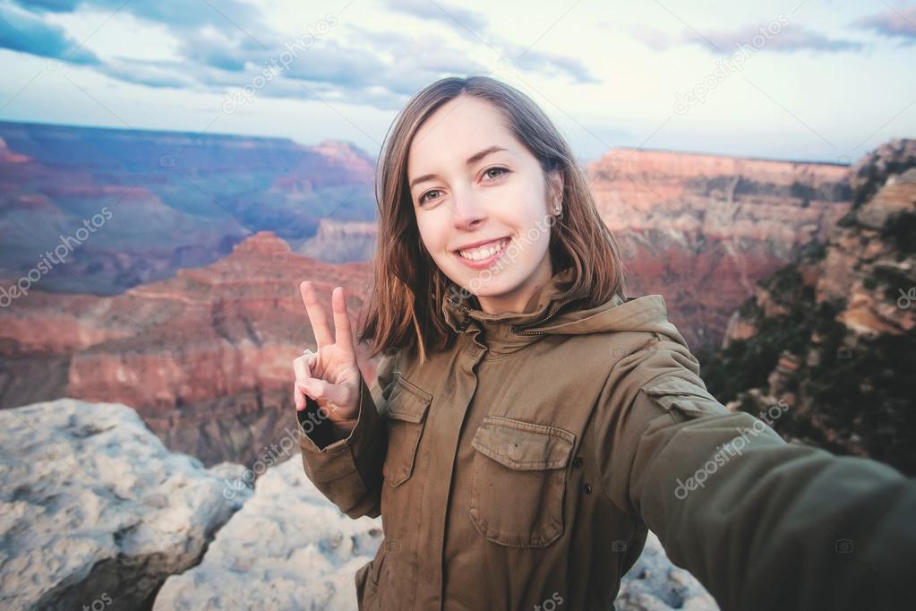 Travel hiking selfie of teenager girl