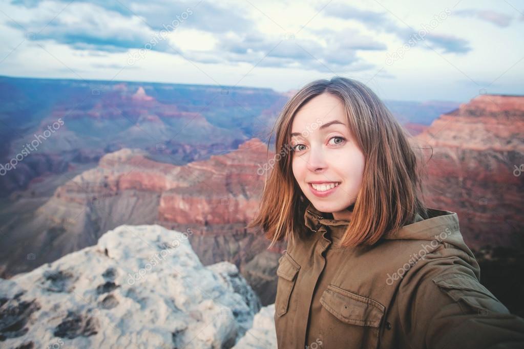 Travel hiking selfie of teenager girl