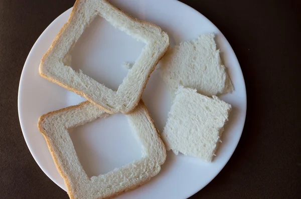 Due fette di pane bianco — Foto Stock