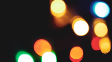 Bulanık lensler tarafından yapılan çok renkli bokeh 'in soyut arkaplan resmi.