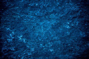 Koyu mavi taş levhaların soyut arka plan deseni. Büyük granit kaya kalıpları. metin için boşluk ile