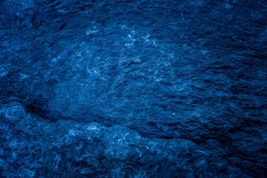 Koyu mavi taş levhaların soyut arka plan deseni. Büyük granit kaya kalıpları. metin için boşluk ile