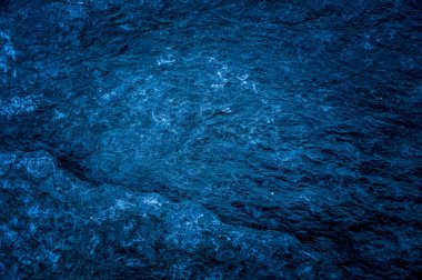 Koyu mavi taş levhaların soyut arka plan deseni. Büyük granit kaya kalıpları. metin için boşluk ile