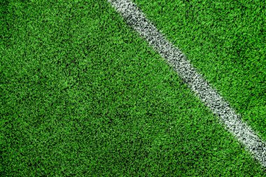 Spor alanı yüzeyi, beyaz işaretli çimenler