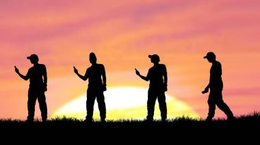 Günbatımı arka planında bir adamın silueti 