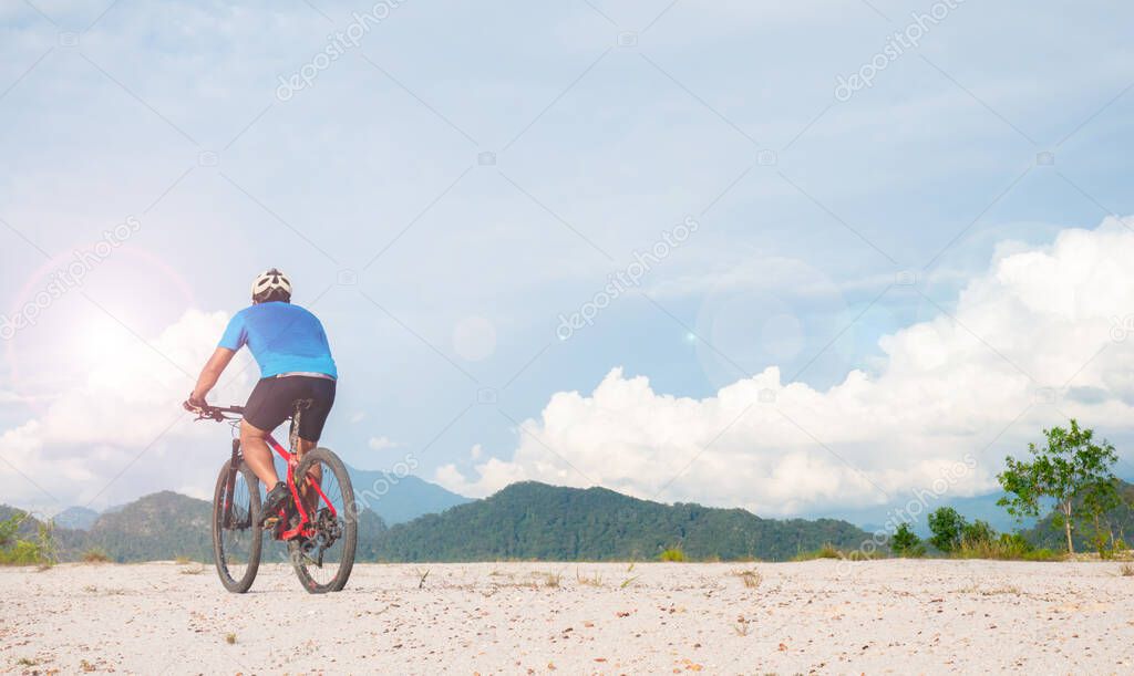 Cyclists traveling on the mountains Happily