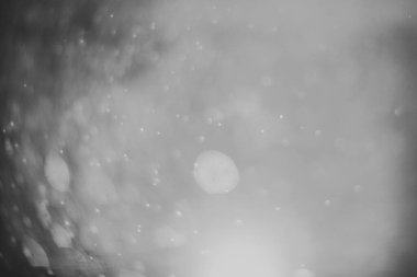 Projenizin arka planı için bulanık bir lensten Bokeh 'in siyah-beyaz görüntüsü.