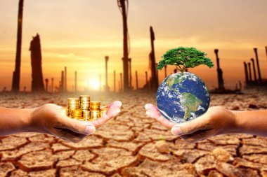 Sol elde para var. Sağ el toprağı tutarken bir bokeh arka planı var. Doğa ya da kapitalizm tasarımı. Resmin ögesi NASA tarafından dekore edilmiştir.