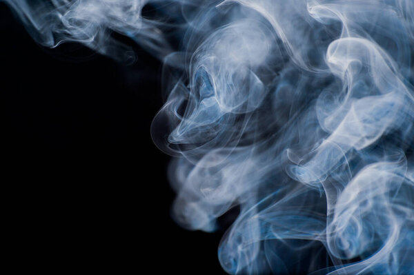 Smoke moving background abstract pattern background on a black background