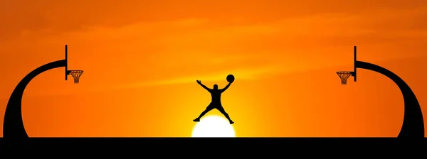 Beautiful outdoor basketball court silhouette with people jumping holding basketballs.