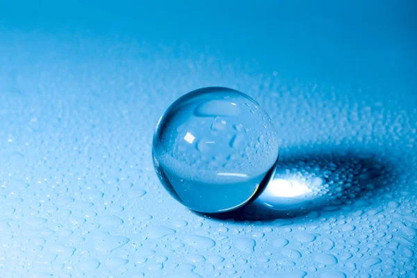 Crystal Ball Placed Water Droplets Crystal Ball Blue Background — Stock Photo, Image