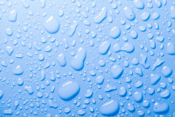 abstract background image of refreshing water drops on blue background