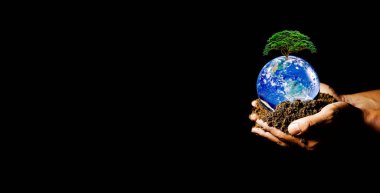 Dünya 'nın güneş tarafından ısıtıldığı yerde dünyayı tutan eller küresel ısınmaya neden olur. Resmin ögesi NASA tarafından dekore edilmiştir.