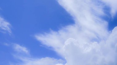 Sky timelapse video of clouds movement on blue sky background, nature concept