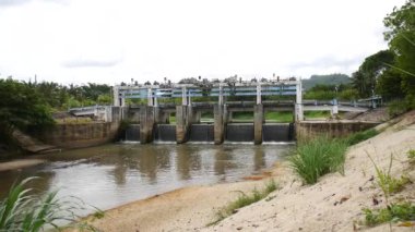 Dams block small canals of rural irrigation systems.