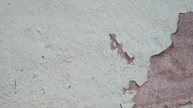 Çatlakları ve çizikleri olan beton bir duvarın dokusu 